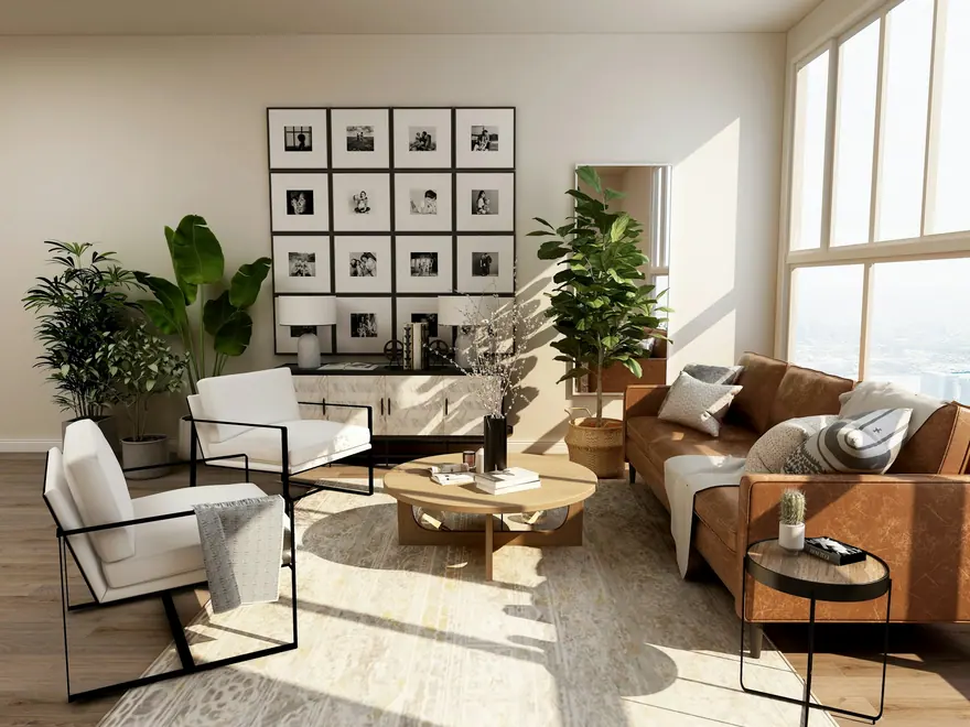 Bright living room with a sofa, armchair and large windows